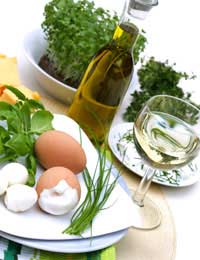 chives alongside wine and other cooking ingredients